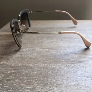 Miu Miu sunglasses. Grey Gold light peach on ear piece Miu Miu | Accessories | Miu Miu Sunglasses Grey Gold Light  main image 2